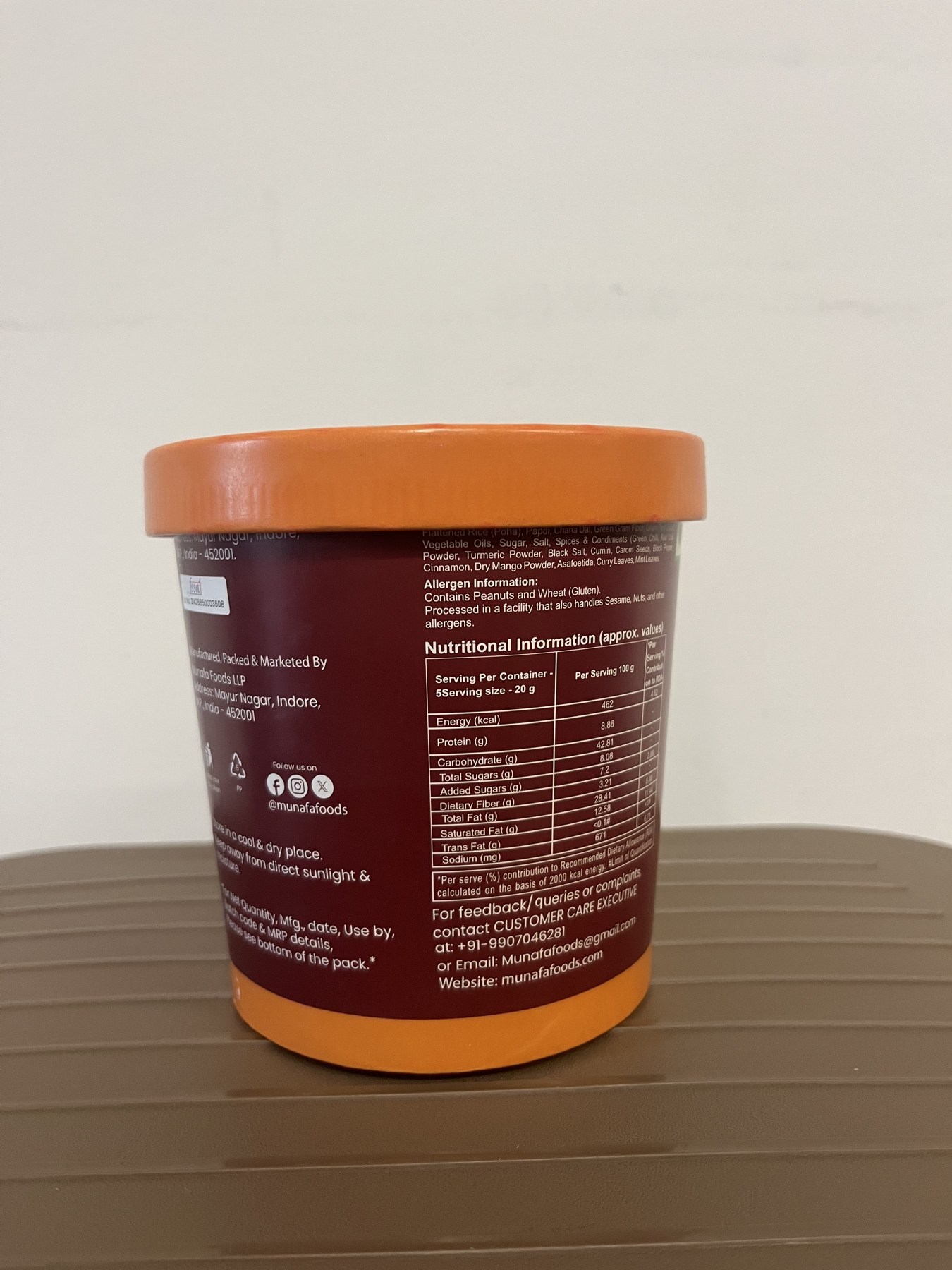 Munafa cup back panel with legal information